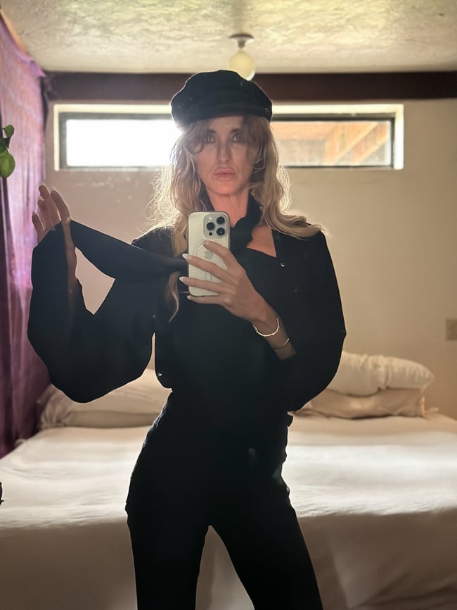 1970s Yves Saint Laurent noir silk tie neck blouse