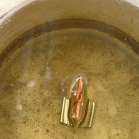 Image 3 of leather rose scented candle