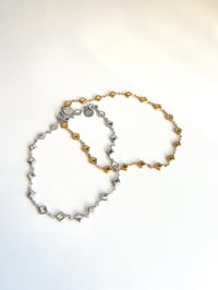 Image 3 of Gold VS Silver Diamond