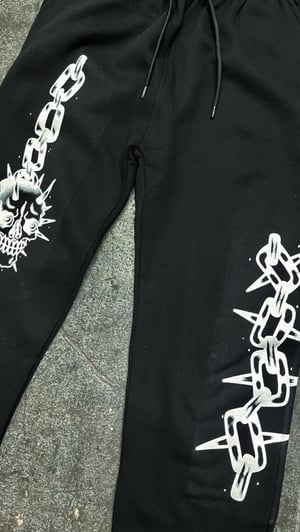 Image of chain sweatpants 