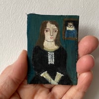 Woman in black with portrait - tiny painting 
