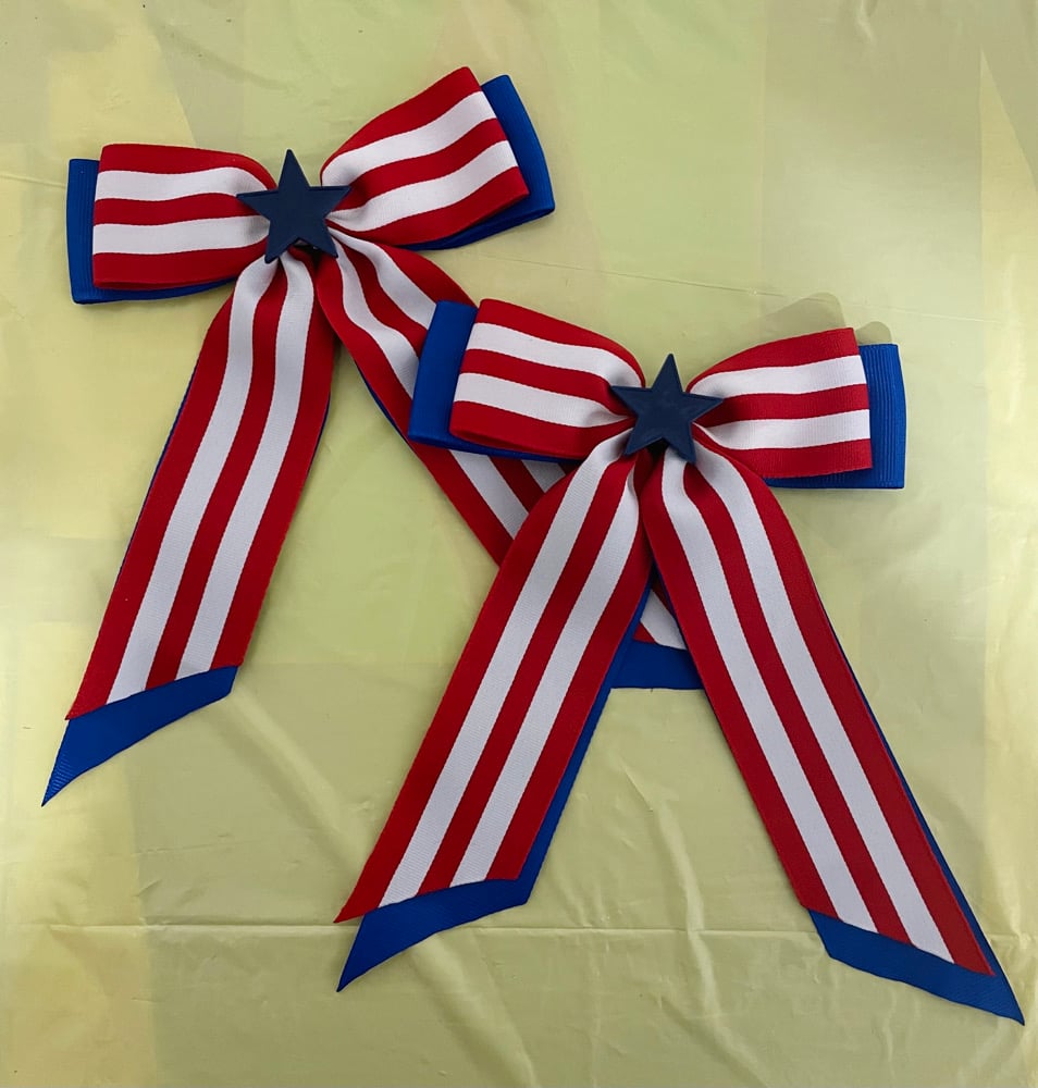 Red white and beautiful bow with tails