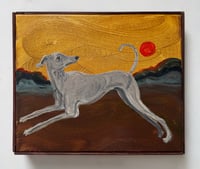 Prancing whippet on ochre