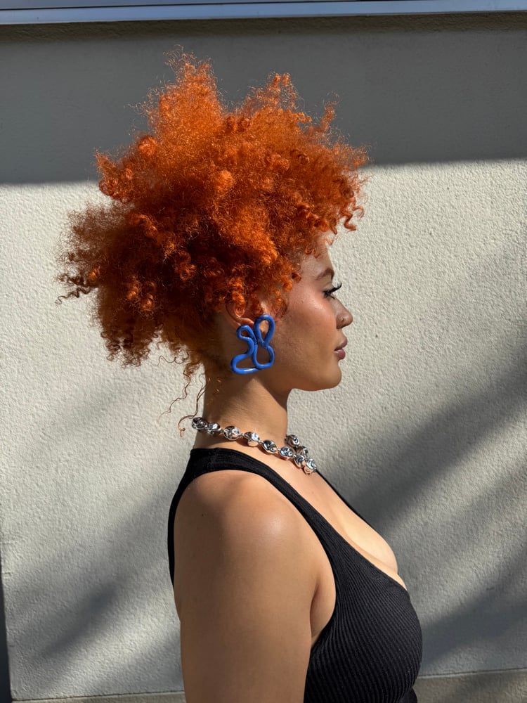 Image of blue cursive piece