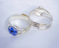 Image 3 of Forget Me Not Adjustable Ring || White Resin Background