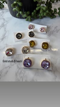 Gold colored studs 