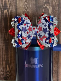 Image 1 of 4th of July Memorial Day Patrotic Red White and Blue Tumbler Straw Topper Bow