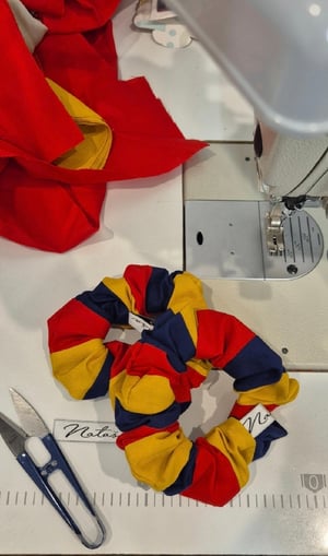 Image of AFL Coloured Scrunchies. Navy Blue, Red & Gold.