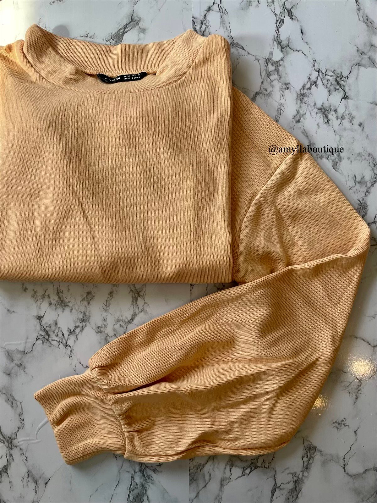 beige crewneck