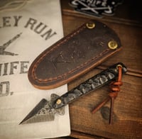 Image 1 of BROKEN ARROW • black with gold web