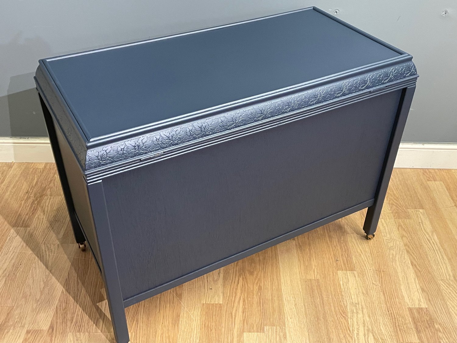 Image of Dark blue blanket storage box