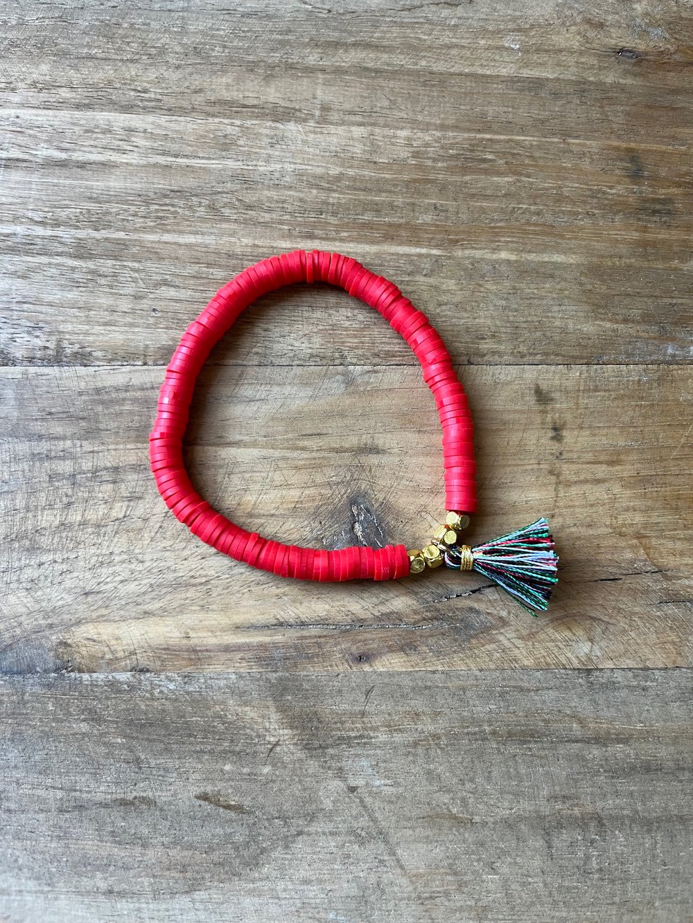 Image of Red Bracelet with Christmas tassel