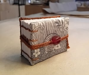 HOZAN — mini livre