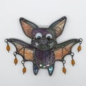 Iridescent purple and orange bat 