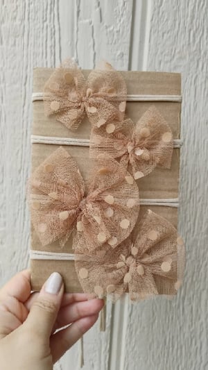 Image of Dottie caramel bows