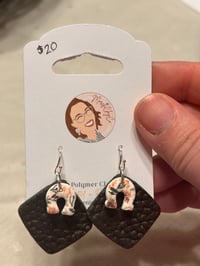 Image 1 of Black Leather Effect with Floral Horse Shoe