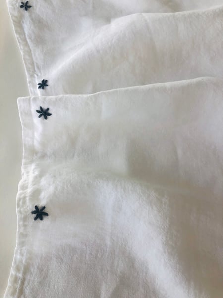 Image of etoile grey hand embroidered linen towel 