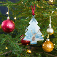 Image 1 of Wooden ornaments (deer in the snow)