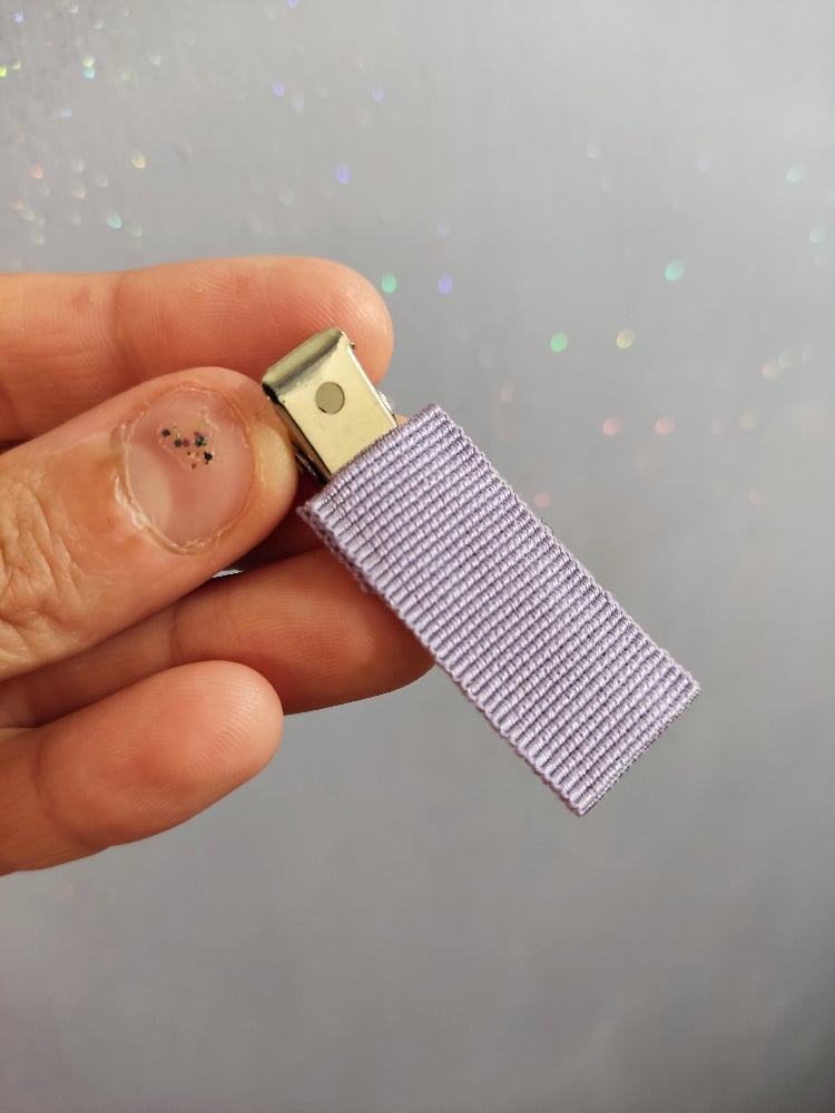Image of Clip barrette lilla e rosa