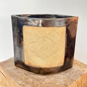 Image of SOUTHWESTERN EYE SHAPE SLAB VASE