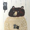 Small square print featuring a bear with coffee