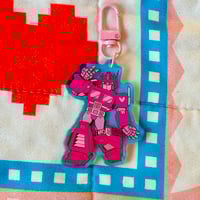 Image 2 of Pink Optimus Charm (PREORDER)