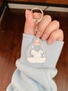 Squirrel Locked in a Garden Acrylic Charm