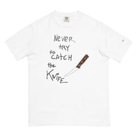 Image 1 of never try to catch the knife