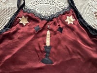 Image 2 of red silk with candle
