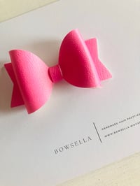candy pink leatherette bow 