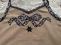 Image 2 of chain bow top