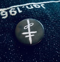 Last Road to the Backwoods “The Symbol” button