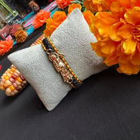 Image 2 of La Negra With Gold Bracelet 