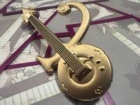 Image 1 of Gold Symbol Guitar