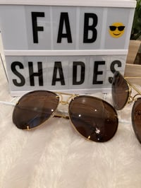 Image 2 of Brown on gold Porshe designs