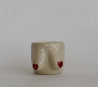 Small red heart nipple tumbler 