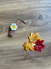 Image 2 of Crochet flower lip balm holder keychain - various colours