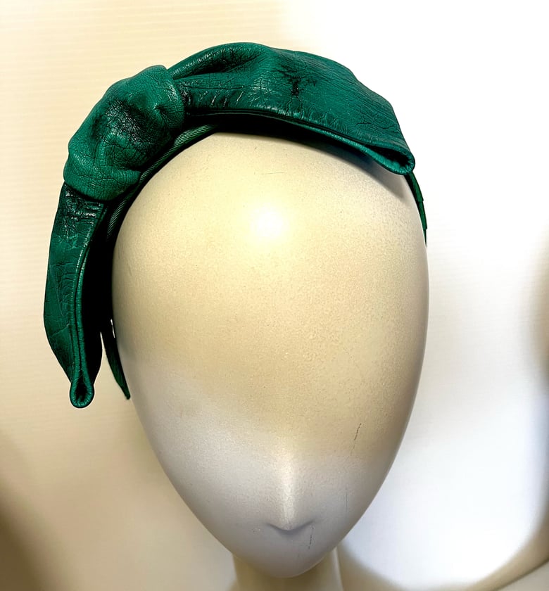 Image of Jade leather bow.