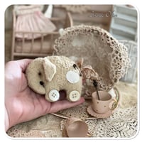 Image 1 of Handmade coffee beige flat elephant with "button wheels"