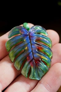 Image 1 of Blueberry green mixed color monstera leaf pendant. 