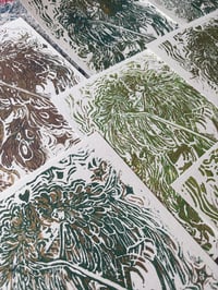 Image 1 of linocut golden harpies 
