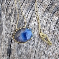 Image 1 of Caged Sapphire
