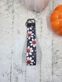 Image 1 of Pumpkin Daisy Wristlet Keychain