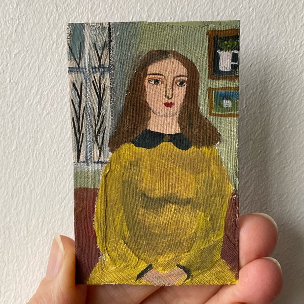 Image of Portrait of a woman by a wintry window - tiny painting 