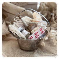 Image 1 of vintage style silver sugar bowl full of vintage French sewing notions