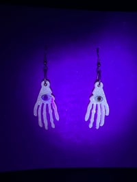 Image 2 of Pink skeleton hand earrings