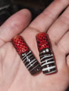 berry beads dipped in chocolate drizzle with white chocolate 