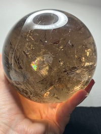 Image 4 of Golden Rutile In Smoky Quartz Sphere #1770