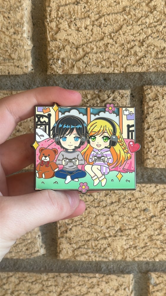 Image of Gaming duo in hand