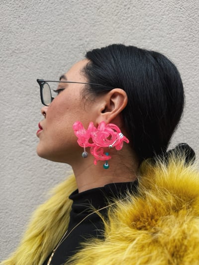 Image of neon pink flexi rod earrings 